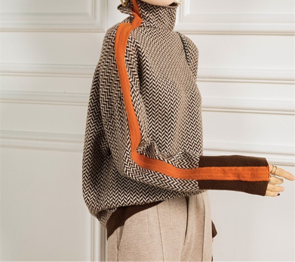 Leah women's turtleneck sweater from Christine Brewer, featuring warm striped knit design and contrast color accents.