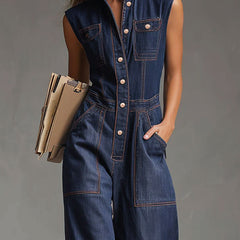 Dark blue denim sleeveless balloon jumpsuit with multiple pockets and wide-leg pants for women by Christine Brewer.