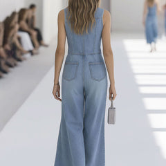 Light blue denim sleeveless wide-leg jumpsuit for women with raw edge details, designed by Christine Brewer.