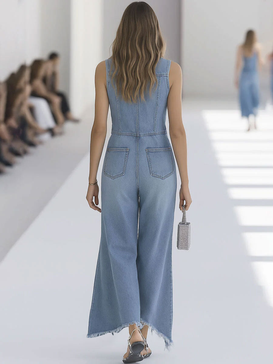 Light blue denim sleeveless wide-leg jumpsuit for women with raw edge details, designed by Christine Brewer.