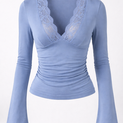 Ruby V-neck top for women by Christine Brewer, featuring a stylish red dress with a flattering fit and elegant neckline.