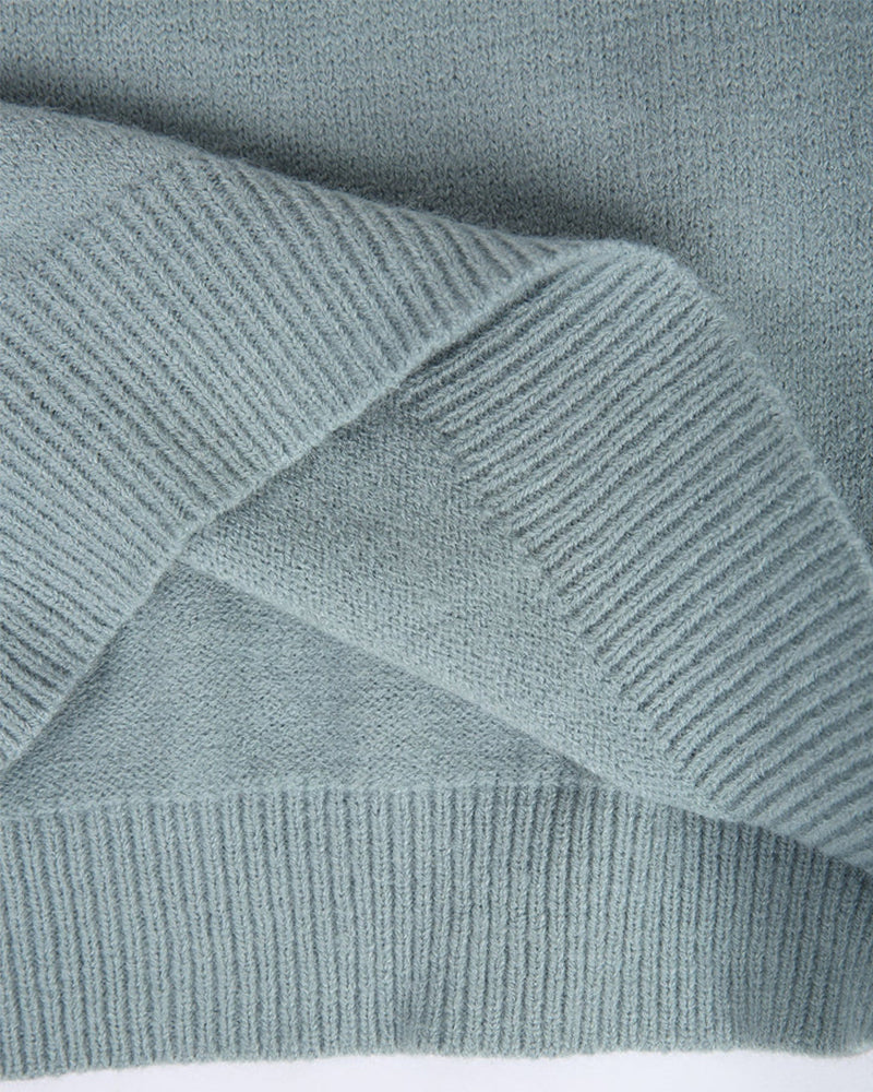 Women’s knit sweater by Christine Brewer in Sydney with a cozy, textured design, perfect for casual wear.