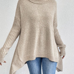 Women’s high neck sweater by Christine Brewer featuring a cozy, stylish design in a neutral color, perfect for casual wear.