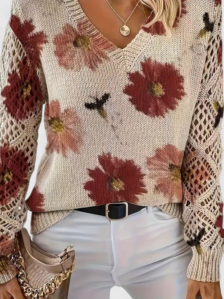 Whitney floral V-neck cardigan for women by Christine Brewer, featuring a colorful floral pattern and lightweight knit fabric.