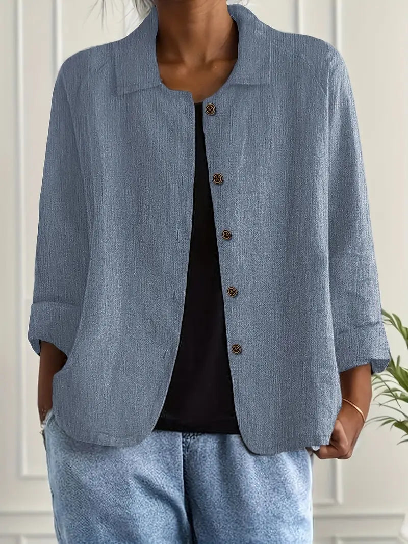 Women’s lightweight casual button-front jacket by Christine Brewer, Ella, shown in a natural outdoor setting