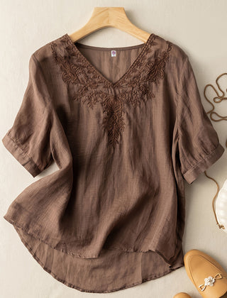 Light beige women's summer blouse by Christine Brewer featuring a V-neckline and flowy linen fabric for casual wear.