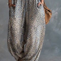 Women’s apricot leopard print chiffon hooded jumpsuit with stylish pants by Christine Brewer, featuring a relaxed fit and bold pattern.