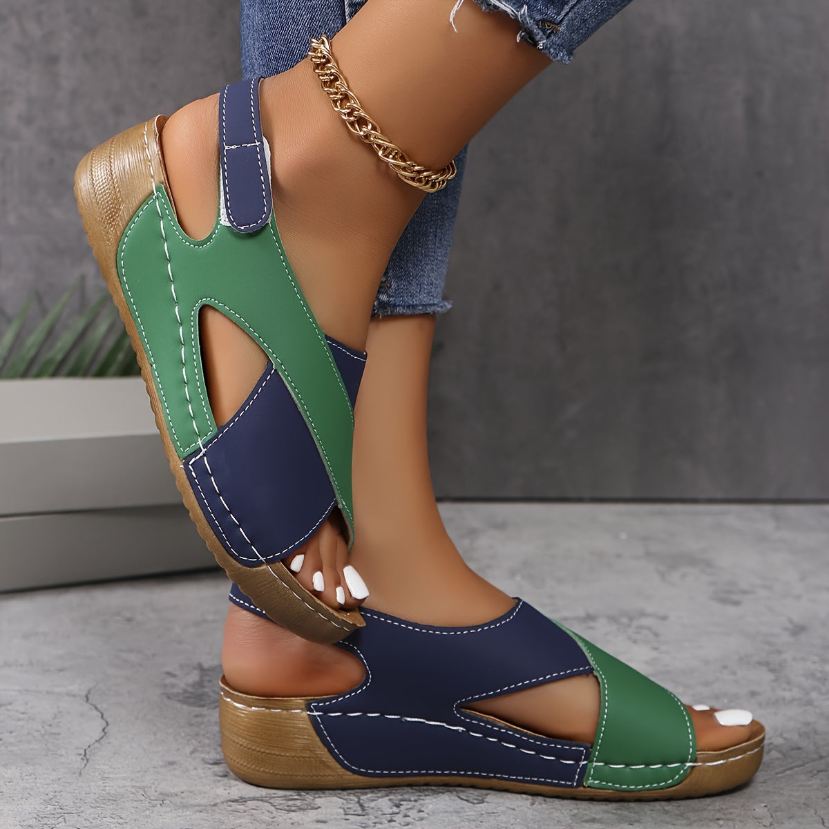 Comfortable orthopedic sandal for women by Christine Brewer, featuring open toe design and cushioned footbed for support and style.