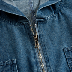Women's denim jumpsuit with long sleeves, hood, zipper, and retro pockets by Christine Brewer, casual and loose fit.
