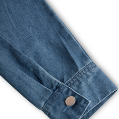 Women’s casual loose fit retro denim jumpsuit with long sleeves, hood, zipper, and pockets by Christine Brewer.