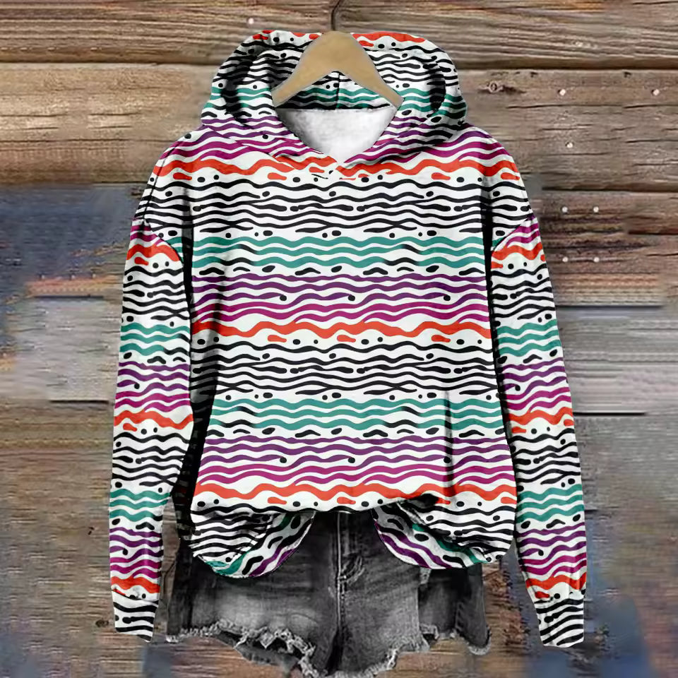 Amber cozy lightweight oversized soft knit hoodie by Christine Brewer, shown in soft amber color with a relaxed fit and hood.