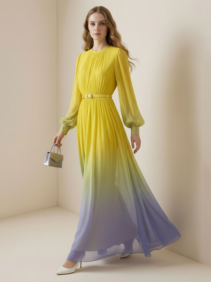 Christine Brewer high waisted maxi dress with long sleeves, belt, contrast color gradient, pleated design, and round neck.
