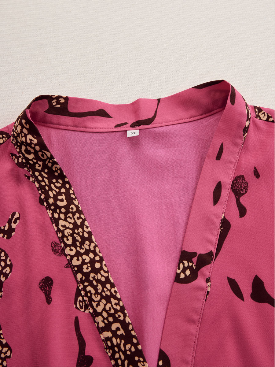 Rose red leopard print chiffon long sleeve jumpsuit for women, stylish and flowy, by Christine Brewer.