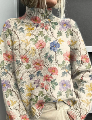 Christine Brewer Danielle women's turtleneck floral sweater, featuring a colorful floral pattern and cozy knit fabric.