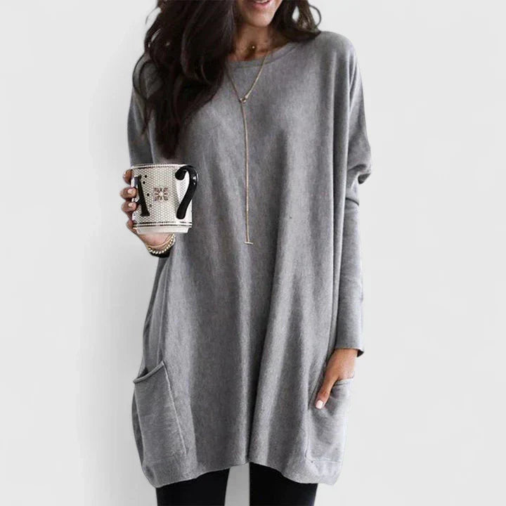 Women’s relaxed fit knit sweater by Christine Brewer, featuring a versatile, comfortable design in soft yarn with long sleeves.