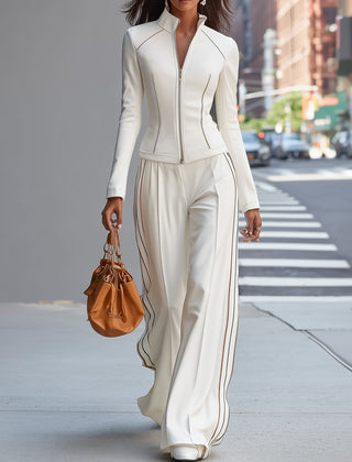 White stand collar zip-up wide-leg women's trouser suit by Christine Brewer, featuring tailored pants and a stylish collar detail.