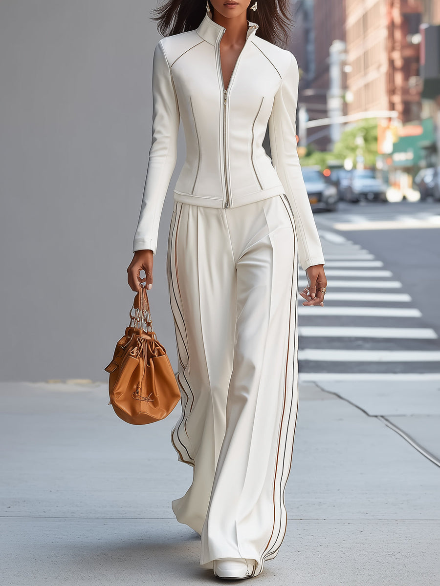White stand collar zip-up wide-leg women's trouser suit by Christine Brewer, featuring tailored pants and a stylish collar detail.