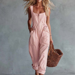 Light yellow denim jumpsuit for women with square neckline and zip front, by Christine Brewer.