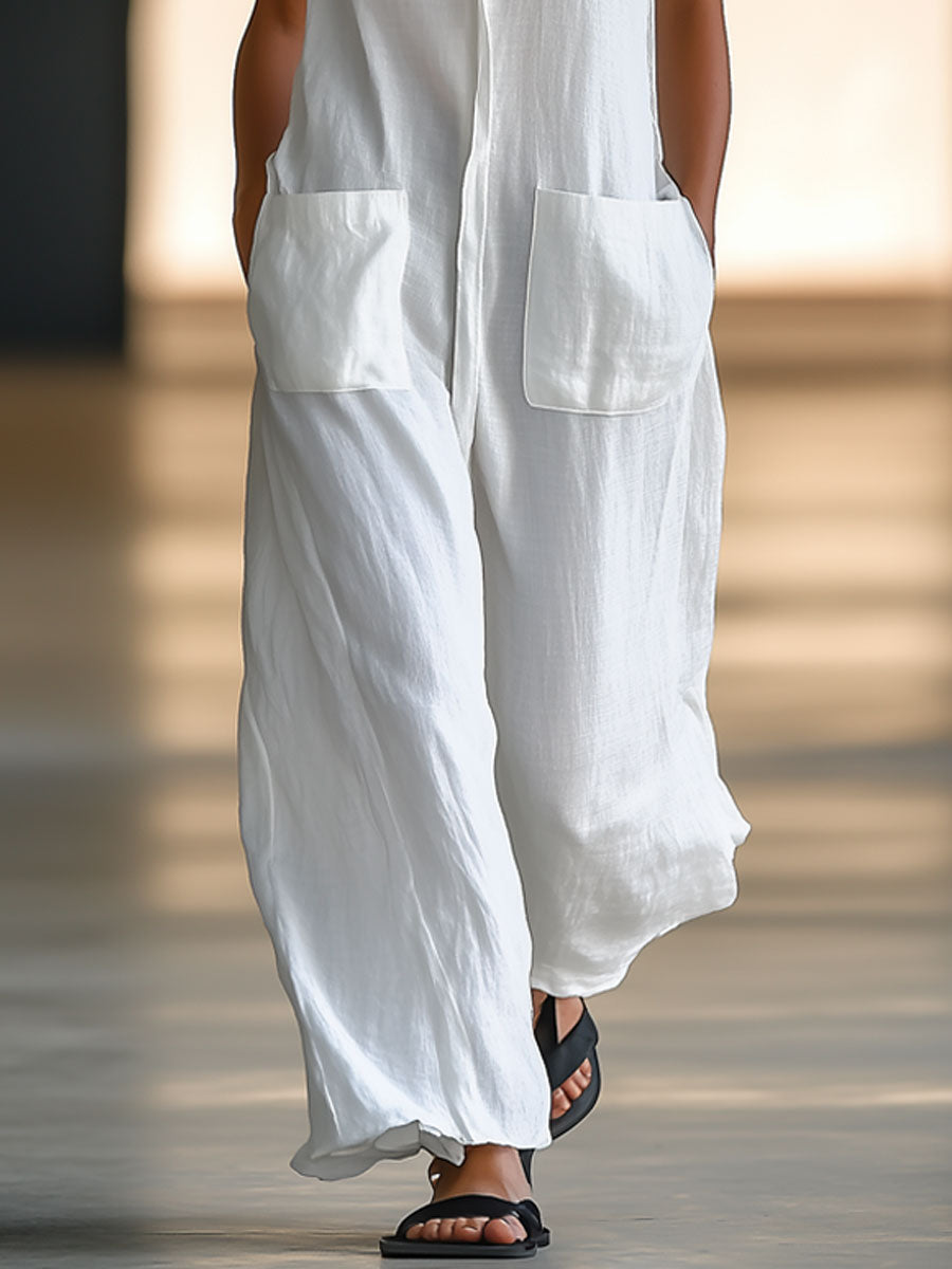 White linen sleeveless wide-leg jumpsuit for women by Christine Brewer, featuring a relaxed fit and stylish design.