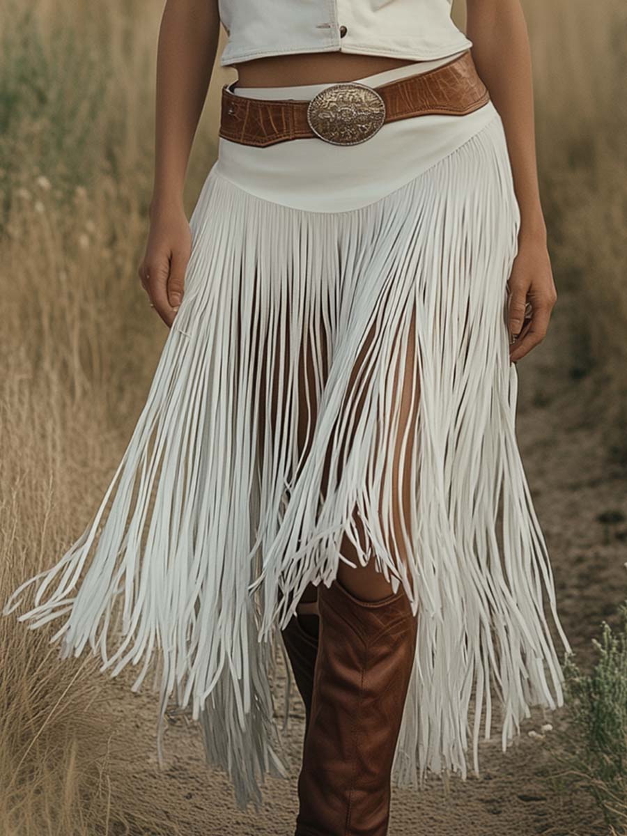 White suede tassel dress by Christine Brewer, casual sleeveless dress with tassel details and a relaxed fit.