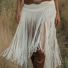 White suede tassel dress by Christine Brewer, casual dress with fringe tassels, displayed on a hanger against a neutral background.