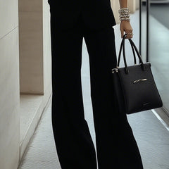 Light blue sleeveless two-piece trouser set with patch pockets for women, stylish pants by Christine Brewer.