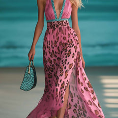 Pink chiffon V-neck maxi dress for women by Christine Brewer, flowing fabric and elegant design, full-length dress with sleeveless style.