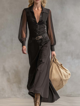 Black denim V-neck maxi dress by Christine Brewer, casual style, featuring a flowing long silhouette and V-shaped neckline.