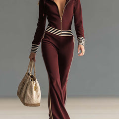 Dark blue knitted hooded zip-up V-neck jumpsuit for women, featuring comfortable pants style by Christine Brewer.