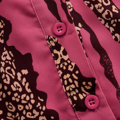 Rose red leopard print chiffon long sleeve jumpsuit for women, stylish pants by Christine Brewer, with flowy fabric and fitted waist.