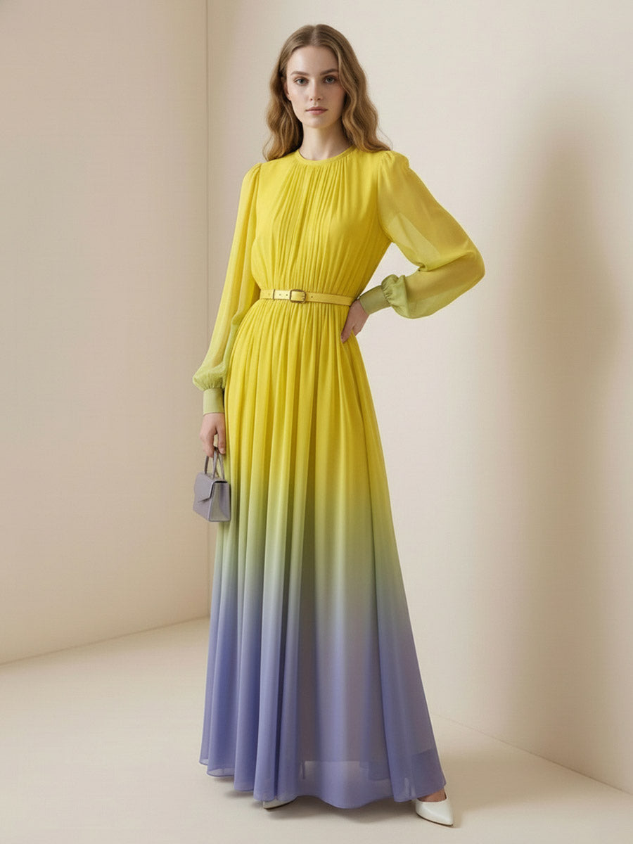 Christine Brewer high waisted maxi dress with long sleeves, belt, contrast color gradient, pleated design, and round neck.