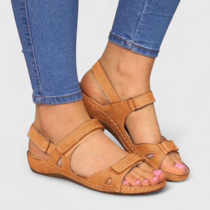 Open-toe ankle-strap sandals for women by Christine Brewer, featuring stylish design and comfortable fit.