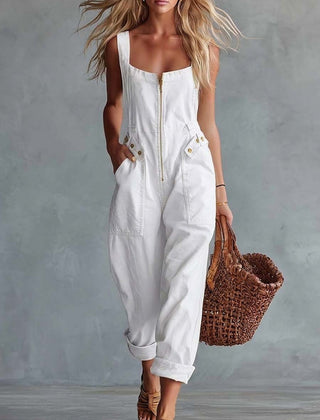 Light yellow denim square neck zip-front jumpsuit for women by Christine Brewer, featuring long sleeves and a fitted waist.