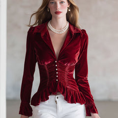 Red velvet pleated ruffled long sleeve blouse by Christine Brewer, featuring elegant ruffles and a rich red color.
