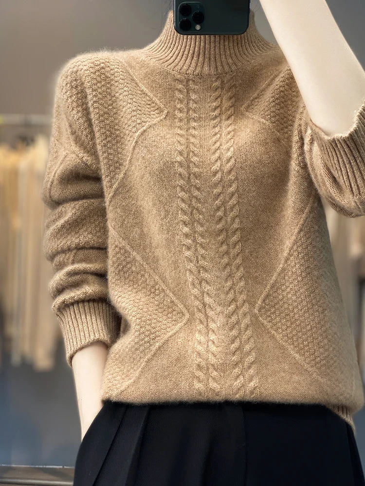 Women's cable knit turtleneck sweater by Christine Brewer, featuring a cozy design and classic turtleneck style.