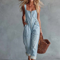 Light yellow denim jumpsuit for women with square neckline and zip-front closure, by Christine Brewer, shown on a model.