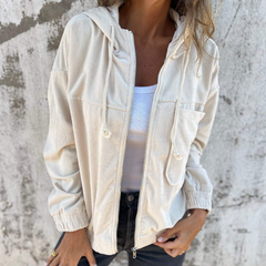 Women’s Adeline hooded jacket by Christine Brewer, featuring a stylish hood and cozy fit, shown in a neutral color.