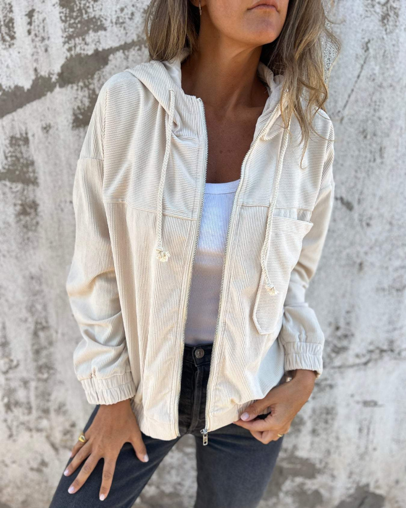 Women’s Adeline hooded jacket by Christine Brewer, featuring a stylish hood and cozy fit, shown in a neutral color.