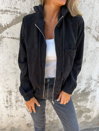 Adeline women's hooded jacket by Christine Brewer, featuring a stylish, lightweight design with a front zipper and adjustable hood.