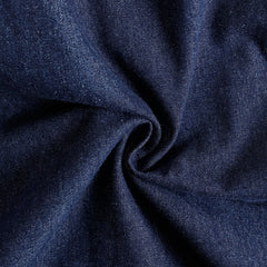 Dark blue denim sleeveless balloon jumpsuit with multiple pockets for women, by Christine Brewer, shown on a model.