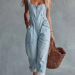 Light yellow denim jumpsuit for women with square neckline and zip-front, designed by Christine Brewer.