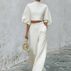 Cream textured lantern sleeve two-piece set for women featuring stylish pants by Christine Brewer, shown in a detailed product image.