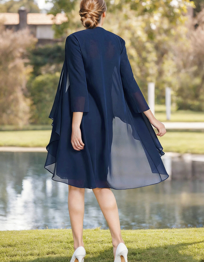 Navy blue tulle midi dress for women by Christine Brewer, featuring pleated two-piece set with elegant flowy design.
