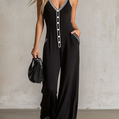 Black color-block V-neck sleeveless jumpsuit by Christine Brewer, featuring button-down front and tailored pant style for women.