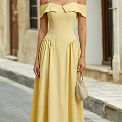Yellow off-the-shoulder sweetheart A-line midi dress by Christine Brewer, featuring a fitted bodice and flowing skirt.