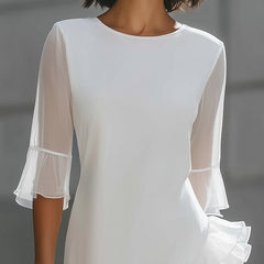Christine Brewer asymmetric ruffle hem sheer sleeve midi dress showing flowing fabric and elegant design details.