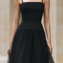 Elegant black tiered tulle maxi dress by Christine Brewer, featuring flowing layers and a sophisticated silhouette.