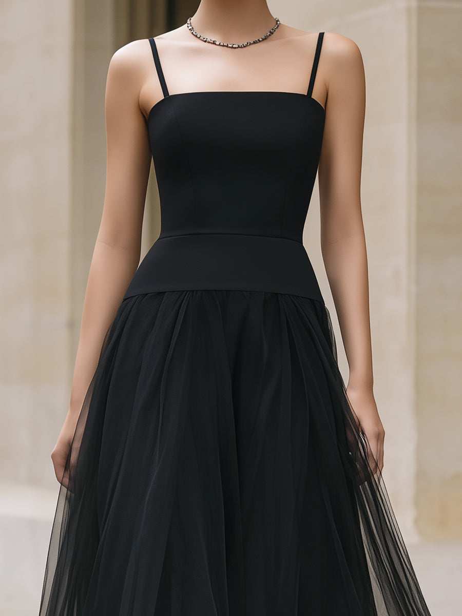Elegant black tiered tulle maxi dress by Christine Brewer, featuring flowing layers and a sophisticated silhouette.
