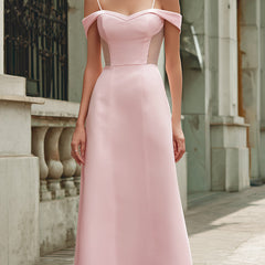 Elegant pink off-the-shoulder maxi dress by Christine Brewer featuring flowing fabric, perfect for wedding guest attire.
