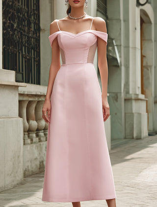 Elegant pink off-the-shoulder maxi dress by Christine Brewer featuring flowing fabric, perfect for wedding guest attire.